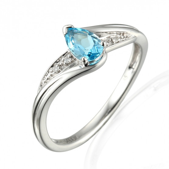 Působivý prsten Roya, bílé zlato s brilianty a blue topazem